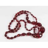 Art Deco faceted cherry amber/bakerlite? graduated bead necklace,