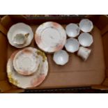 A late 19th century French teas set for six, comprising cups, saucers, side plates and a cake plate,
