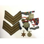 WW2 British 1939-45 Star and War Medal (no ribbons) along with pair of Highland Light Infantry cap