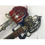 A pair of Scottish Basket Hilt Swords: Scottish Basket hilted Sword with 83cm long double edged