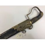 A Georgian era Naval Officers Cutlass with 65cm long curved blade. No makers marks.