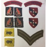 WW2 British cloth formation signs and paperwork group: Pair 11th Armoured Division (Printed on felt,