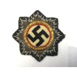 WW2 Third Reich Deutscher Kreuz im Gold Stoffausführung.