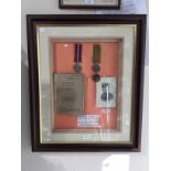 WW2 British ATS Medal group of War Medal and Defence Medal mounted in a frame along with photo of