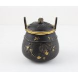 A Japanese Iron Meiji period twin handled  Koro with gilt decoration, with fruit finial  perfect