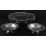 A pair of silver circular pedestal dishes and matching circular pedestal bowls, by Mappin & Webb