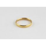 A 22ct. yellow gold band, shank hallmarked for 22 carat gold. (3.9g)