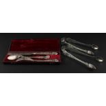 Two pairs of George IV silver Kings pattern sugar tongs, by Charles Eley, assayed London 1827, of