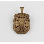 A Latin American 18ct. yellow gold pendant/brooch, of angular form, pierced and engraved with