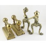 A pair of brass fire dogs with claw and ball terminals together with another pair (4)