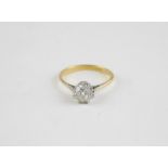 ***CLIENT COLLECTED 15/4 ****SW***An 18ct. gold and solitaire diamond ring, claw set single round