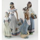 A collection of  large Lladro figures depicting a dancer model 2424 and three similar models with