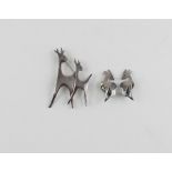 A Ra and La Danish sterling silver brooch in the from of two stylised deer and pair of earrings en