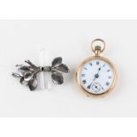 A ladies' 9ct. gold pocket watch, crown wind, having white enamel Roman numeral dial and Arabic