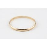 A 9ct. rose gold bangle, of circular form, hallmarked for 9 carat gold, width 6mm x diameter