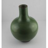 A 19th century Chinese bulbous porcelain monochrome vase, with celadon glaze,30 cm high Condition: