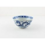 A c19th Chinese porcelain bowl with hand painted dragon, Four character mark to base