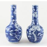 A pair of late 19th cent Chinese prunus blossom porcelain vases, four character marks to base height