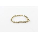 A 14k chain with yellow gold Belcher link bracelet, impressed "14K", with lobster claw clasp stamped