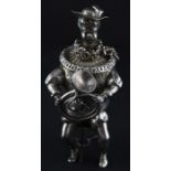 A scarce novelty German silver musical figure tea caddy/box attributed to Ludwig Neresheimer,