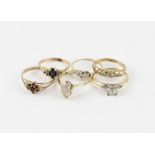Six assorted gold and stone set rings, to include; a 9 ct. yellow gold and diamond cross-over