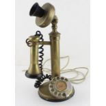 An early 20th century  stick telephone.