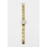 A Tewor 18ct. gold ladies' bracelet watch, manual movement, having signed circular dial with