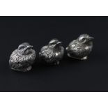 three similar novelty silver "chick" salt and pepper shakers, to include; A Victorian novelty silver