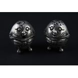 A scarce Edwardian novelty silver "Humpty Dumpty" mustard and pepper shaker set, by Cornelius