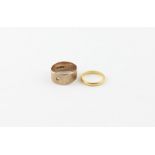 A 22ct. yellow gold band, hallmarked Birmingham 1937, (2.8g), together with a 9ct. rose gold