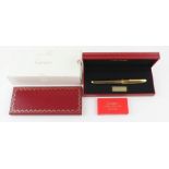 A Louis Cartier Serie Limitee fountain pen, gold and black striped finish, screw cap signed "Louis