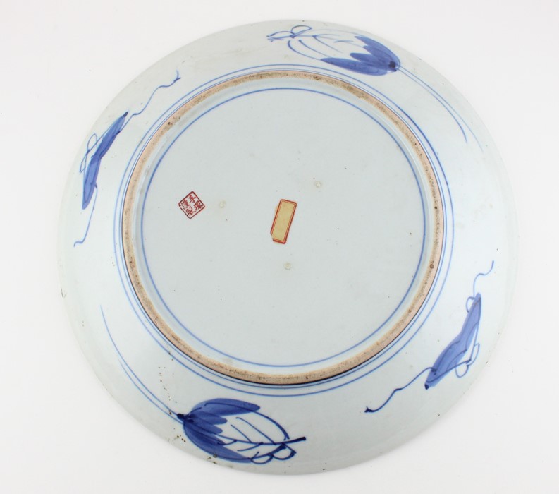 A Japanese Meiji period porcelain charger, decorated with blossom and Crane, diameter 37.1cm. - Image 3 of 4