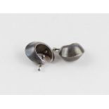 A pair of Georg Jensen sterling silver stylised cuff  earrings, No.126, design by Nanna Ditzel, with
