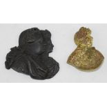 George III & Queen Charlotte; A cast iron medallic ornament, conjoined busts right, he in armour and
