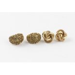 A pair of 14ct. gold earrings, fashioned as interwoven coils of polished and textured finish