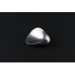 A Georg Jensen sterling silver oyster brooch, No.328, by Nanna and Jorgen Ditzel, plain polished,