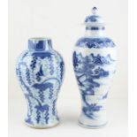 Two 18th century Chinese blue and white vases, one is slender baluster form with knop lid and of