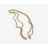 A 9ct. yellow gold flat curb link chain, clasp impressed "9k", length 81.5cm. (22.2g)