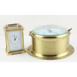 A 20th century carriage clock and brass cased ships clock