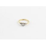 An 18ct. gold and diamond ring, c.1920's, platinum set old round brilliant cut diamond (diamond