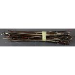 A collection of antique violin bows