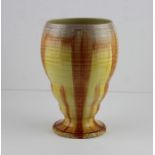 A Shelley slip ware ovoid vase, printed mark. 21 cm high