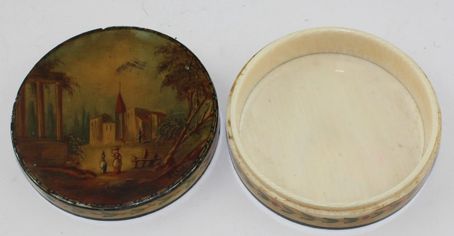 A 19th century Ivory Indian circular box and cover, the lid painted with a European landscape with - Image 3 of 4