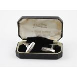 A pair of Georg Jensen silver cuff links #90, designed by Flemming Eskilden for Goerg Jensen, having
