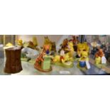 A collection of Royal Doulton Winnie the Poo figures,