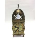 An eight day brass cased mantle clock,