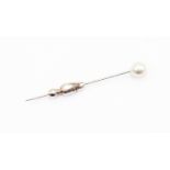 A Gubelin 18 ct white gold cultured pearl stick complete in box