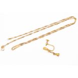 A 14 kt gold earring A.F, a 9 ct gold chain, total gross weight approx 2.