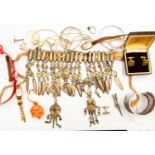 A collection of jewellery to include early silver Libyan jewellery comprising 2 bangles and a