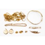 A collection of 9ct gold items including chains, bracelets,
